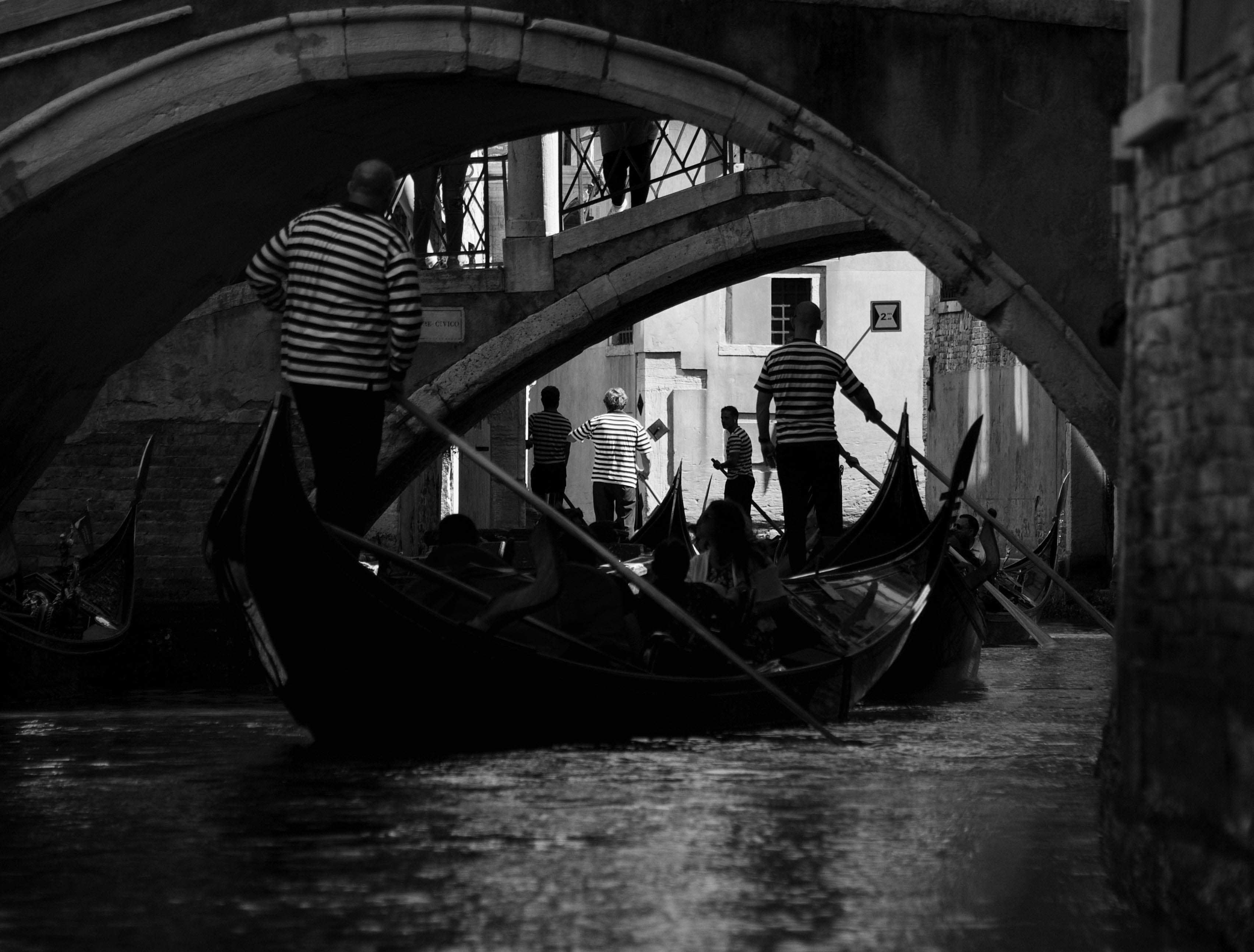 Low key bridge gondola Venice