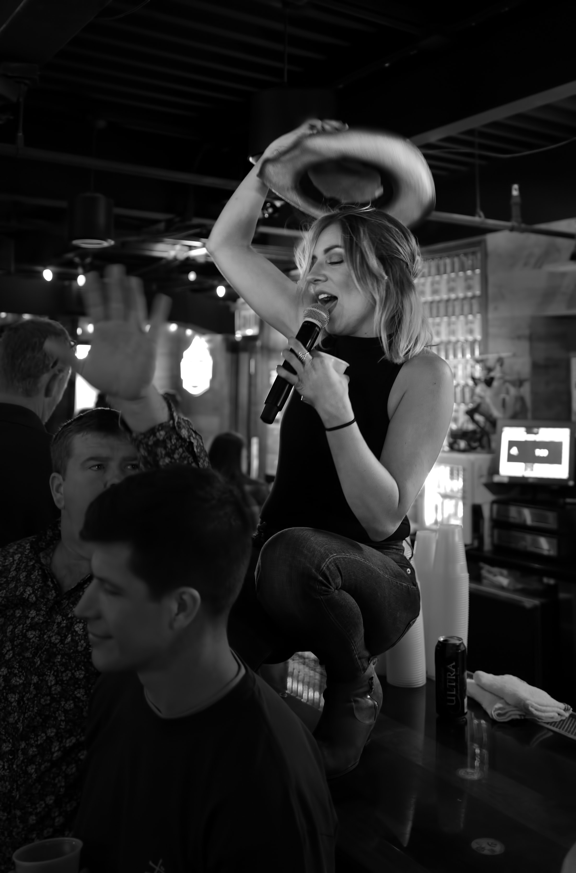 Brittnie stealin'hats at Redneck Riviera Nashville